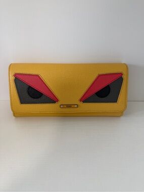 Fendi Yellow Leather Continental Wallet with Red and Black Eye Appliqués